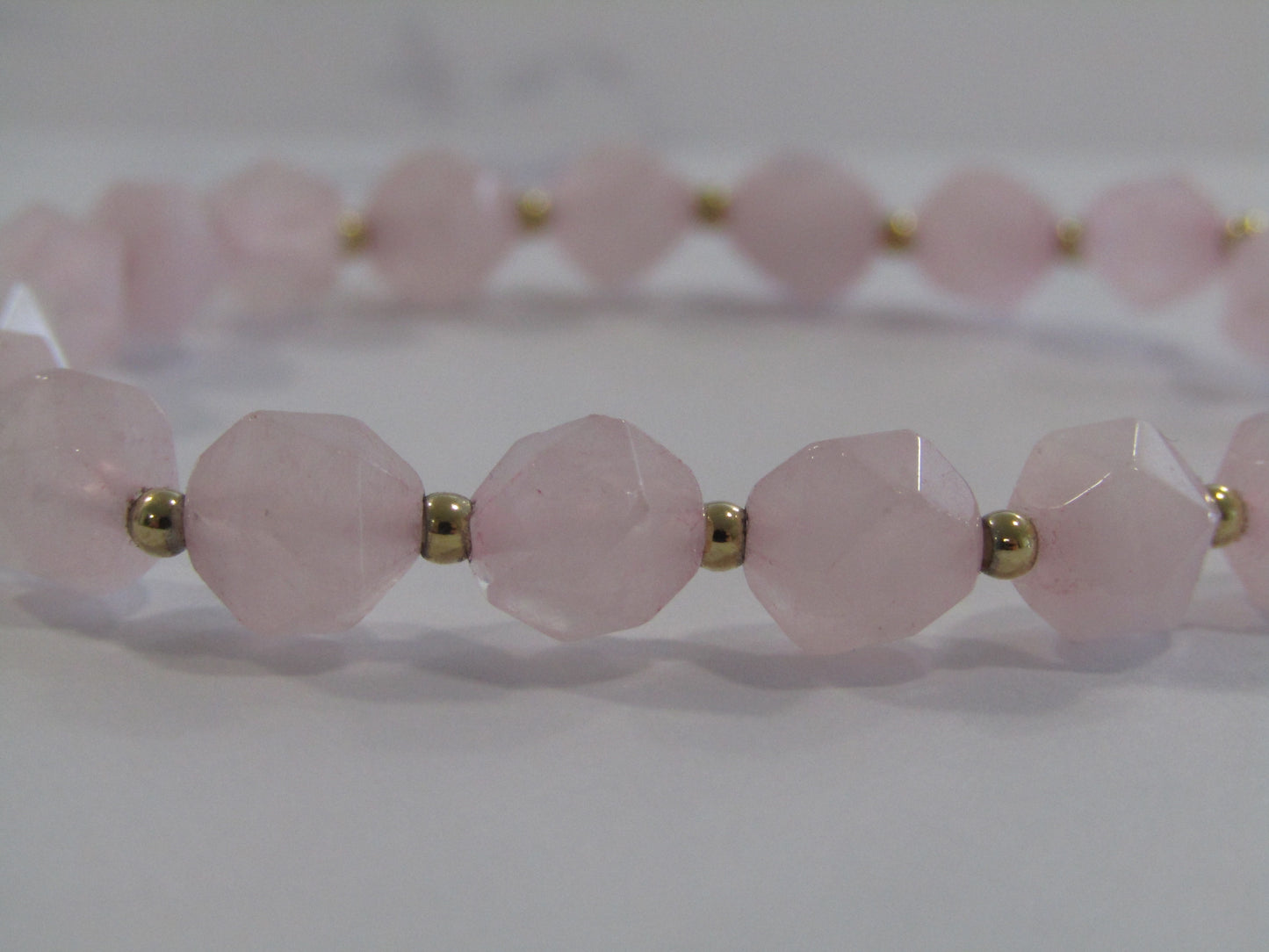 Rose Quartz star cut bracelet with 24k gold plated spacer beads - 8mm