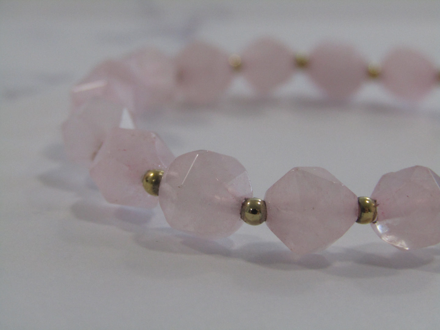 Rose Quartz star cut bracelet with 24k gold plated spacer beads - 8mm