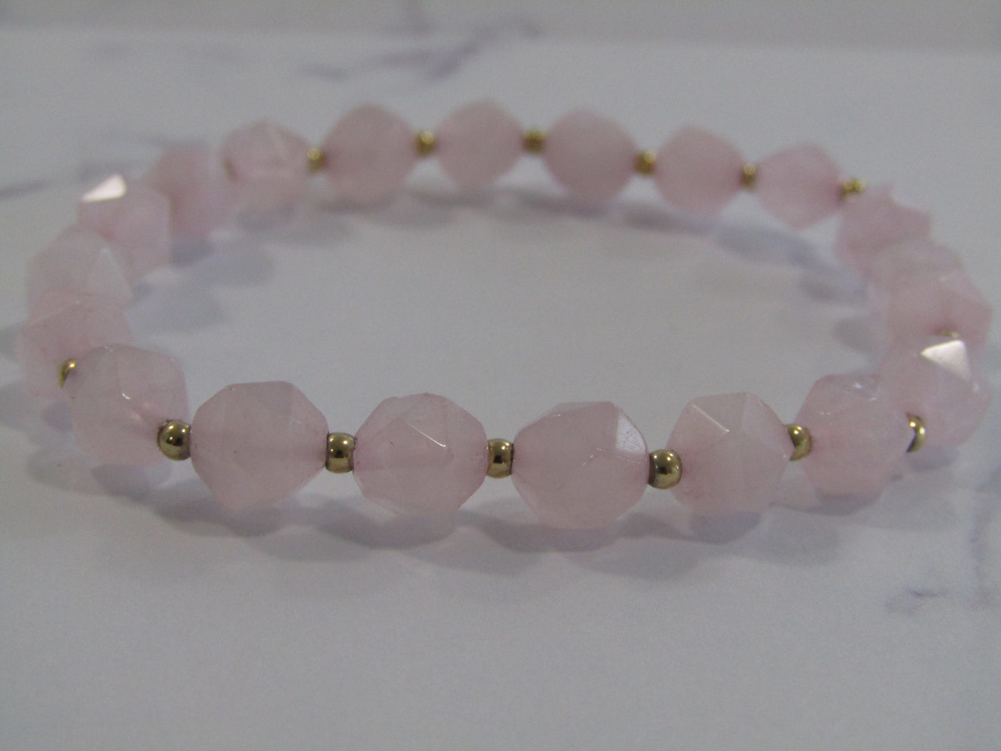 Rose Quartz star cut bracelet with 24k gold plated spacer beads - 8mm