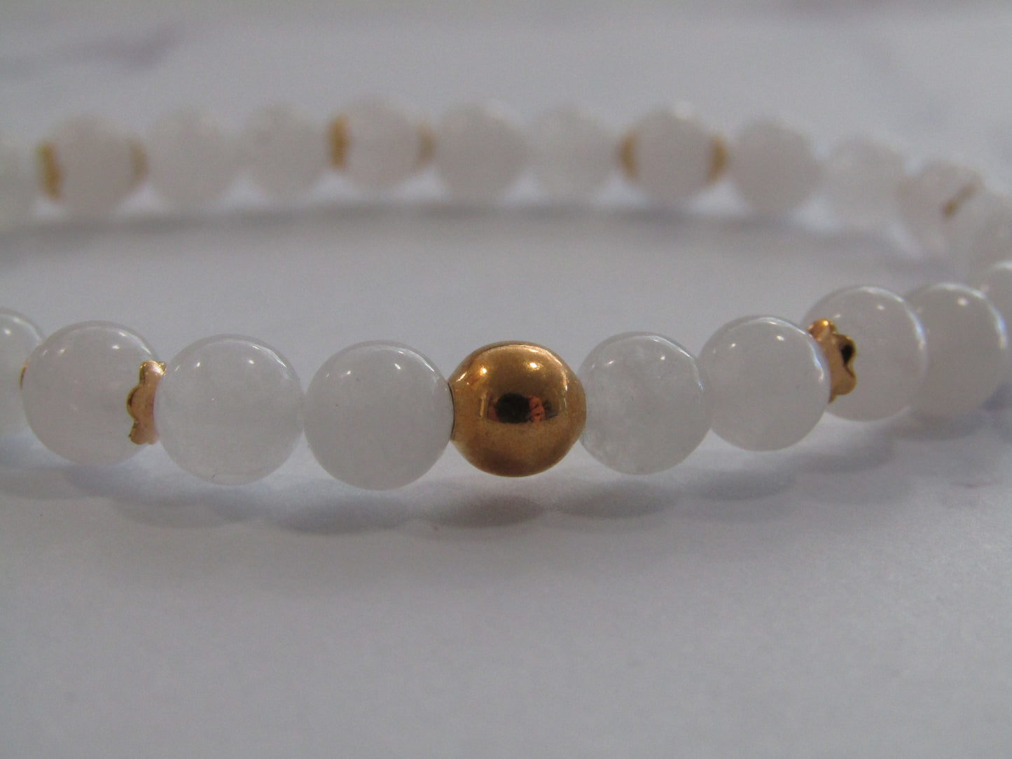 White Jade bracelet with 18k gold plated bead & caps (7mm)