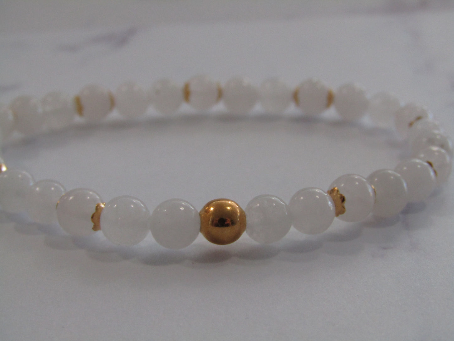 White Jade bracelet with 18k gold plated bead & caps (7mm)