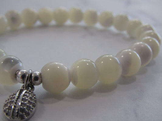 Natural white shell bracelet with 925 sterling silver spacer beads and Cubic Zirconia charm (8mm)