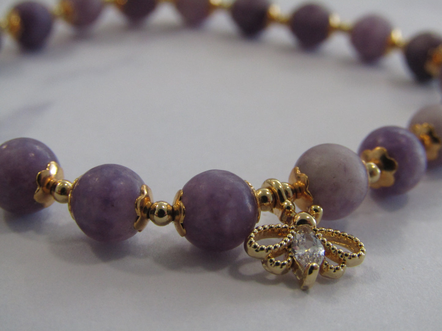 Lepiodolite / Purple Mica Stone (6mm) bracelet with 18k gold plated butterfly charm and spacer beads