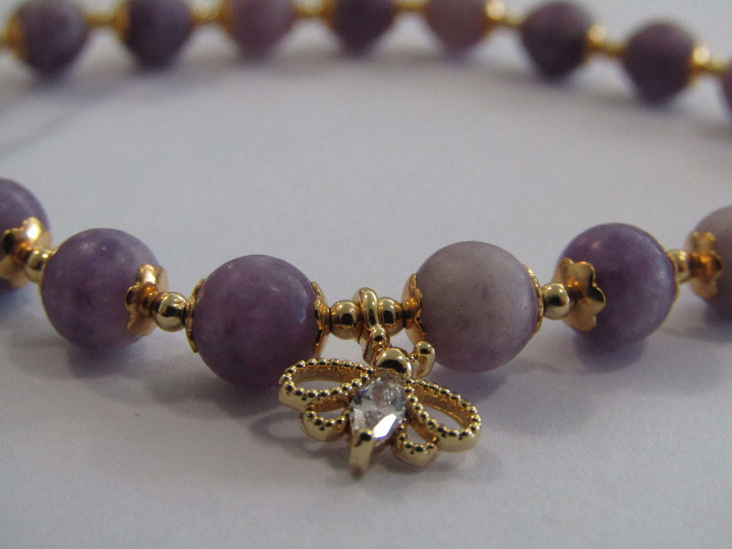 Lepiodolite / Purple Mica Stone (6mm) bracelet with 18k gold plated butterfly charm and spacer beads