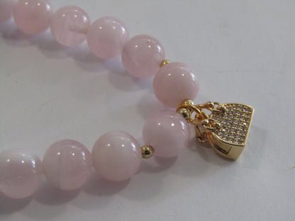 Grade A Madagascar Rose Quartz (8mm) bracelet with 18k gold plated Cubic Zirconia handbag charm