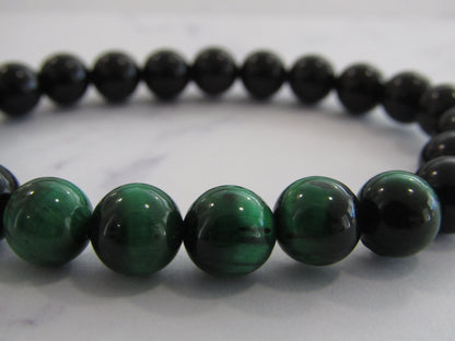 Obsidian bracelet with 5 x Green (dyed) Tigers Eye beads (8mm)