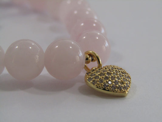 Madagascar Rose Quartz bracelet with 18k gold plated spacer beads and 18k gold plated Cubic Zirconia heart charm - 8mm