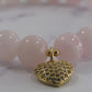 Madagascar Rose Quartz bracelet with 18k gold plated spacer beads and 18k gold plated Cubic Zirconia heart charm - 8mm