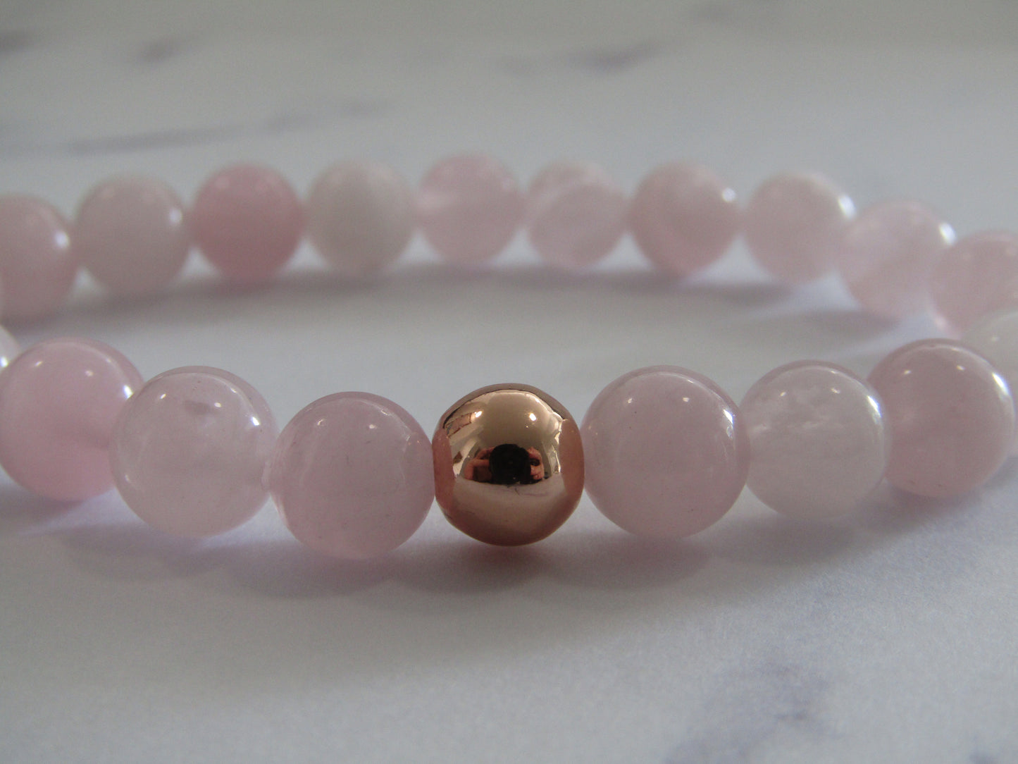 Grade AB Madagascar Rose Quartz with 24k rose gold plated bead