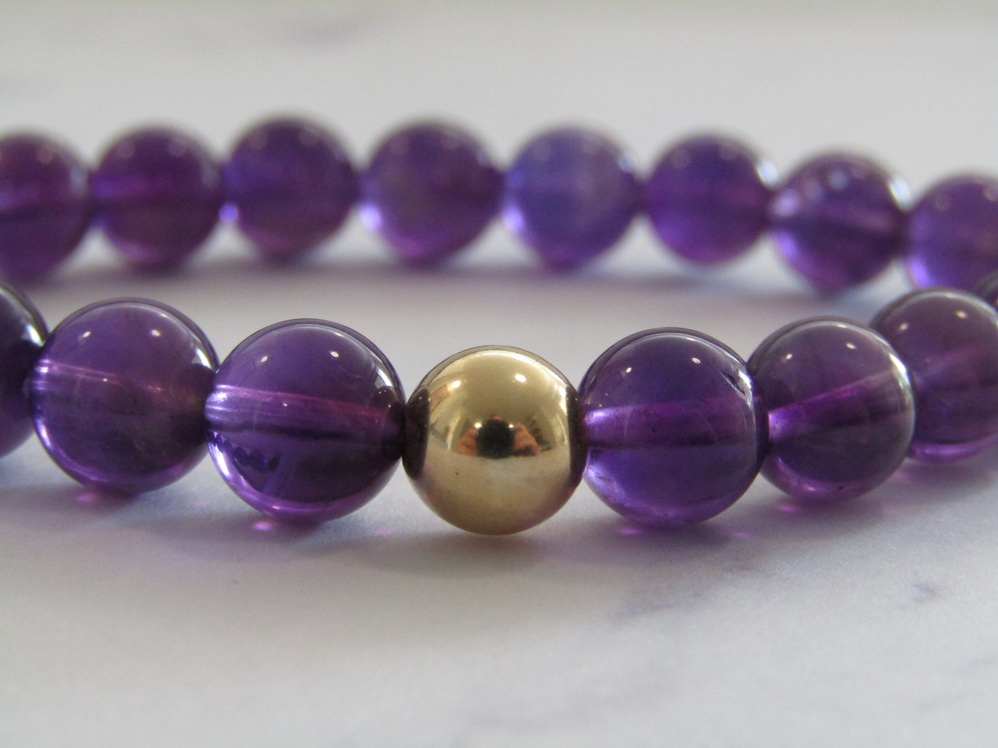 Grade AA+ AMETHYST bracelet with 14k gold filled bead