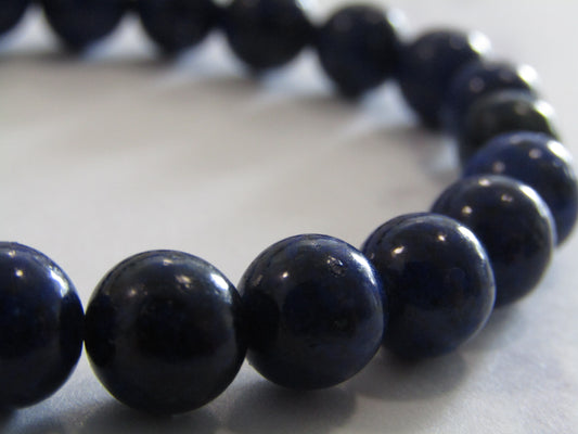 Grade A Lapis Lazuli (8mm) bracelet (filled with gold coloured glue)