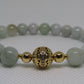 Grade A Jadeite (8mm) bracelet with 18k gold plated Cubic Zirconia bead and 18k gold plated spacers