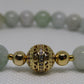 Grade A Jadeite (8mm) bracelet with 18k gold plated Cubic Zirconia bead and 18k gold plated spacers