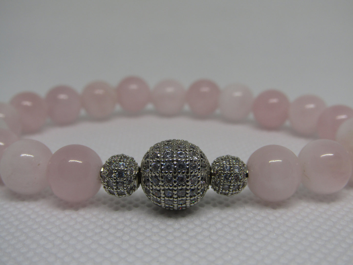 Grade AB Madagascar Rose Quartz bracelet with cubic zirconia silver beads - 8mm