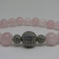 Grade AB Madagascar Rose Quartz bracelet with cubic zirconia silver beads - 8mm