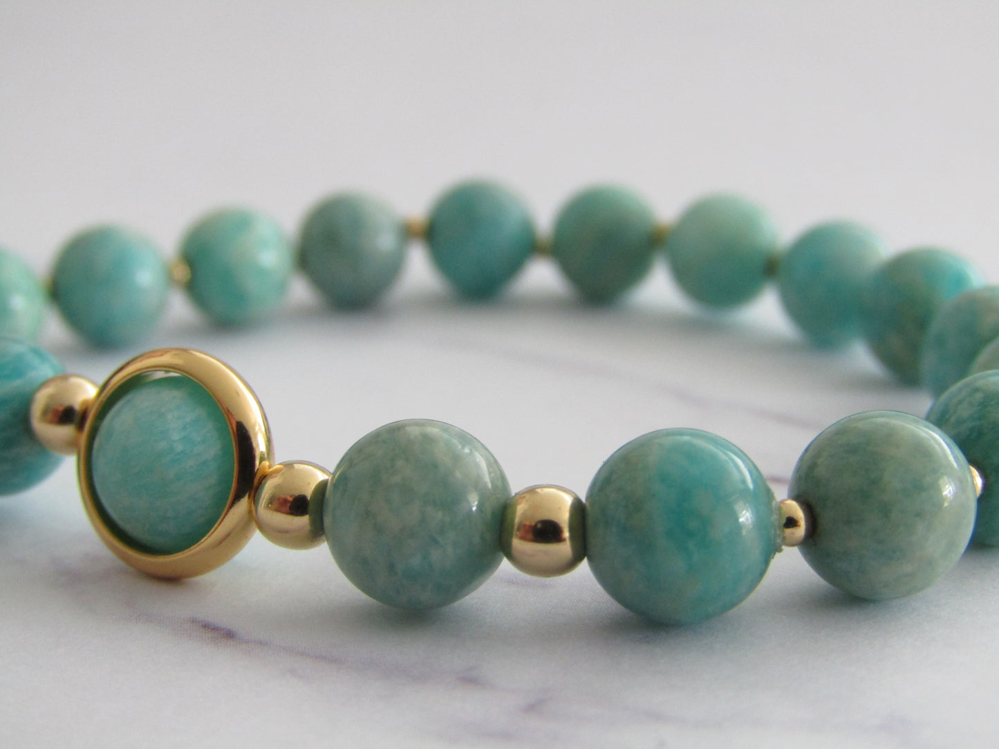 Grade A Amazonite bracelet with 14k gold plated frame and spacer beads - 8mm