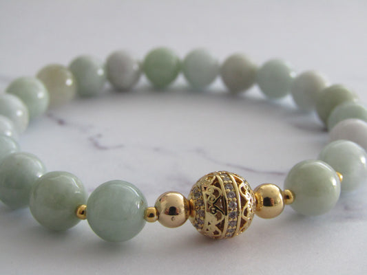 Grade A JADEITE bracelet with 18K gold plated cubic zirconia bead and 18k gold plated spacer beads - 8mm