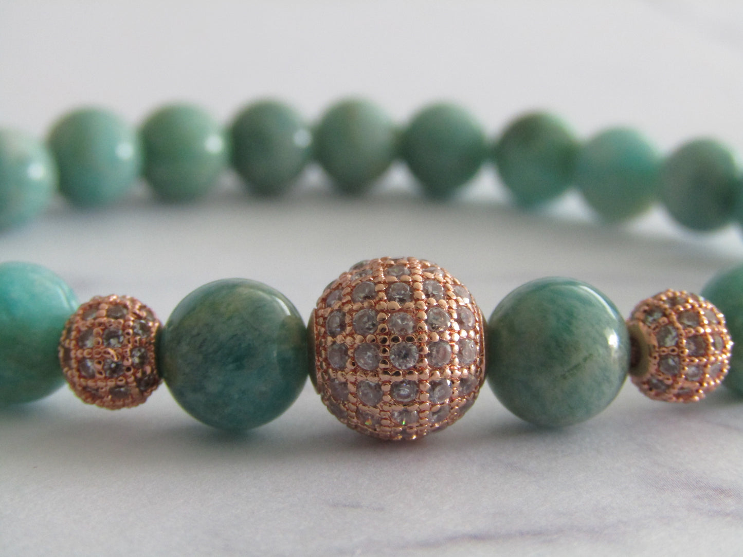 Grade A Amazonite bracelet with rose gold Cubic Zirconia beads - 8mm