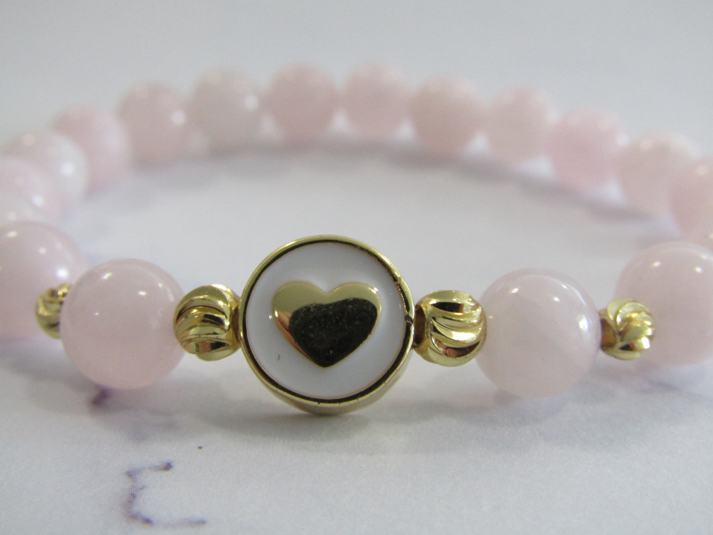 Madagascar Rose Quartz (8mm) bracelet with 18k gold plated bead and heart charm