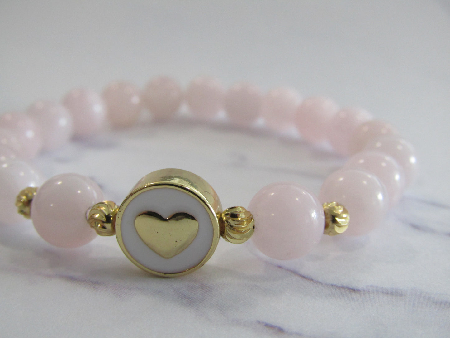 Madagascar Rose Quartz (8mm) bracelet with 18k gold plated bead and heart charm