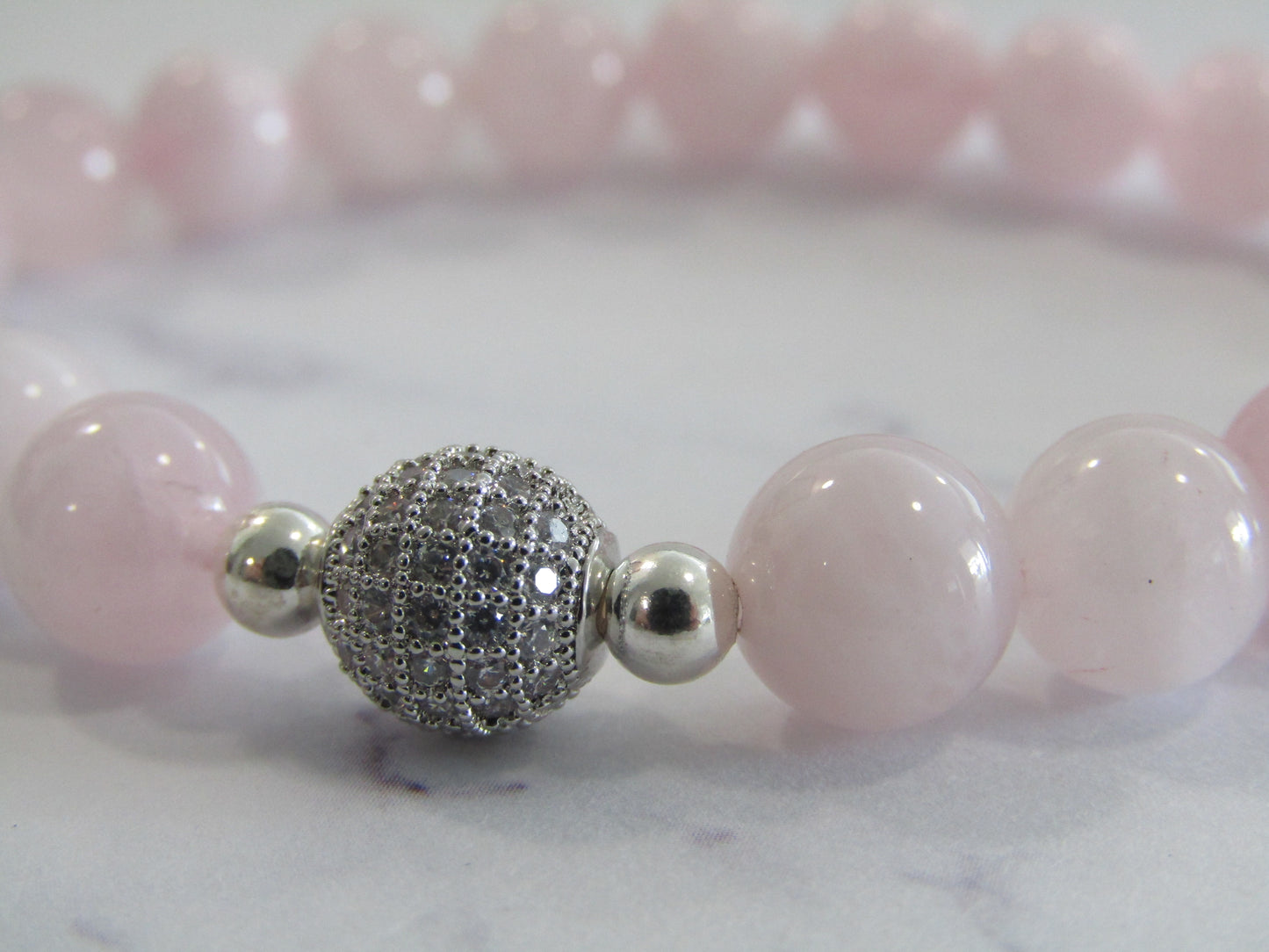 Grade A Madagascar Rose Quartz bracelet with 925 sterling silver plated beads and cubic zirconia silver bead - 8mm