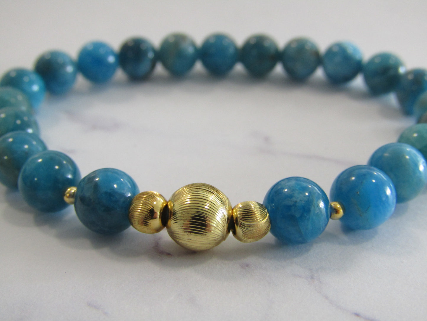 Grade A Apatite bracelet with 18k gold plated beads - 8mm