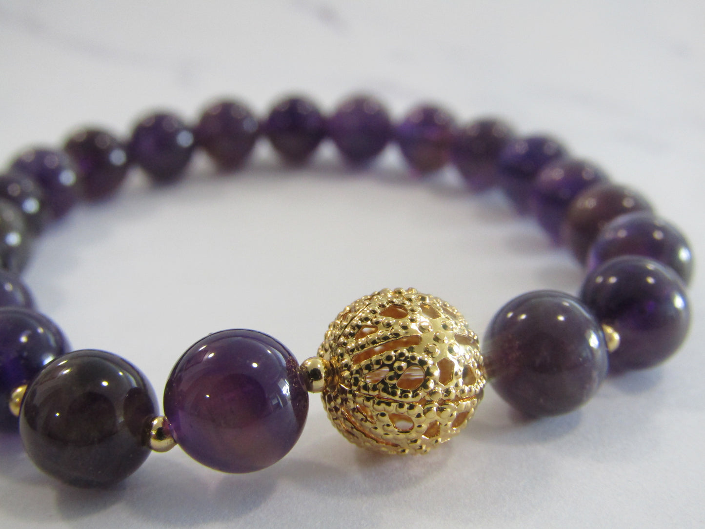 Grade A Amethyst bracelet with 18k gold plated beads - 8mm