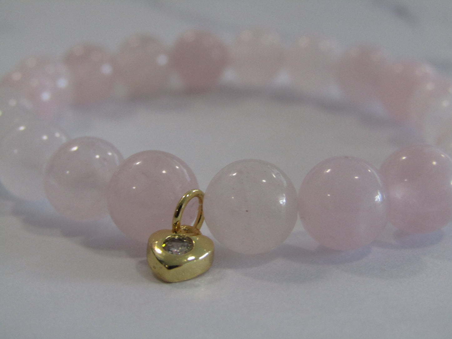 Rose Quartz bracelet with cubic zirconia heart charm - 8mm