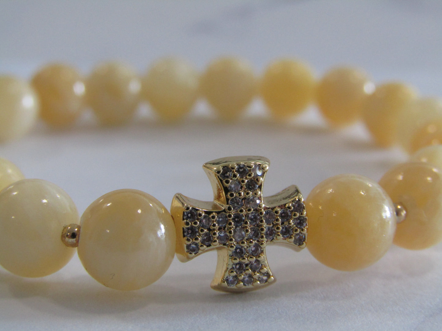 Lemon Jade (8mm) bracelet with 18k gold plated Cubic Zirconia cross charm & spacer beads