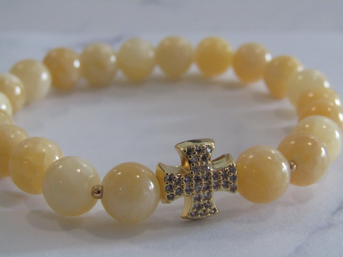 Lemon Jade (8mm) bracelet with 18k gold plated Cubic Zirconia cross charm & spacer beads