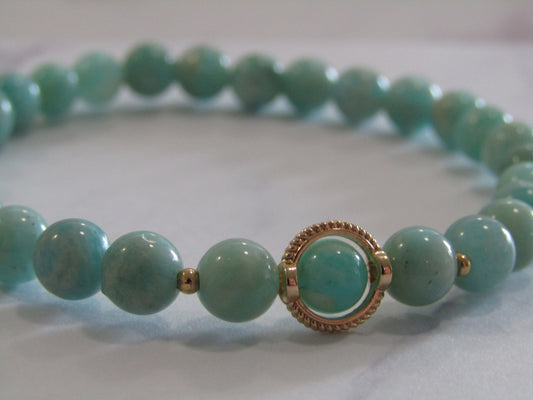 Grade A Amazonite (6mm) bracelet with 18k gold plated frame and spacer beads