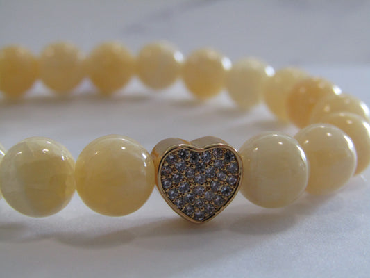 Yellow Jade bracelet with 18k gold plated Cubic Zirconia heart bead