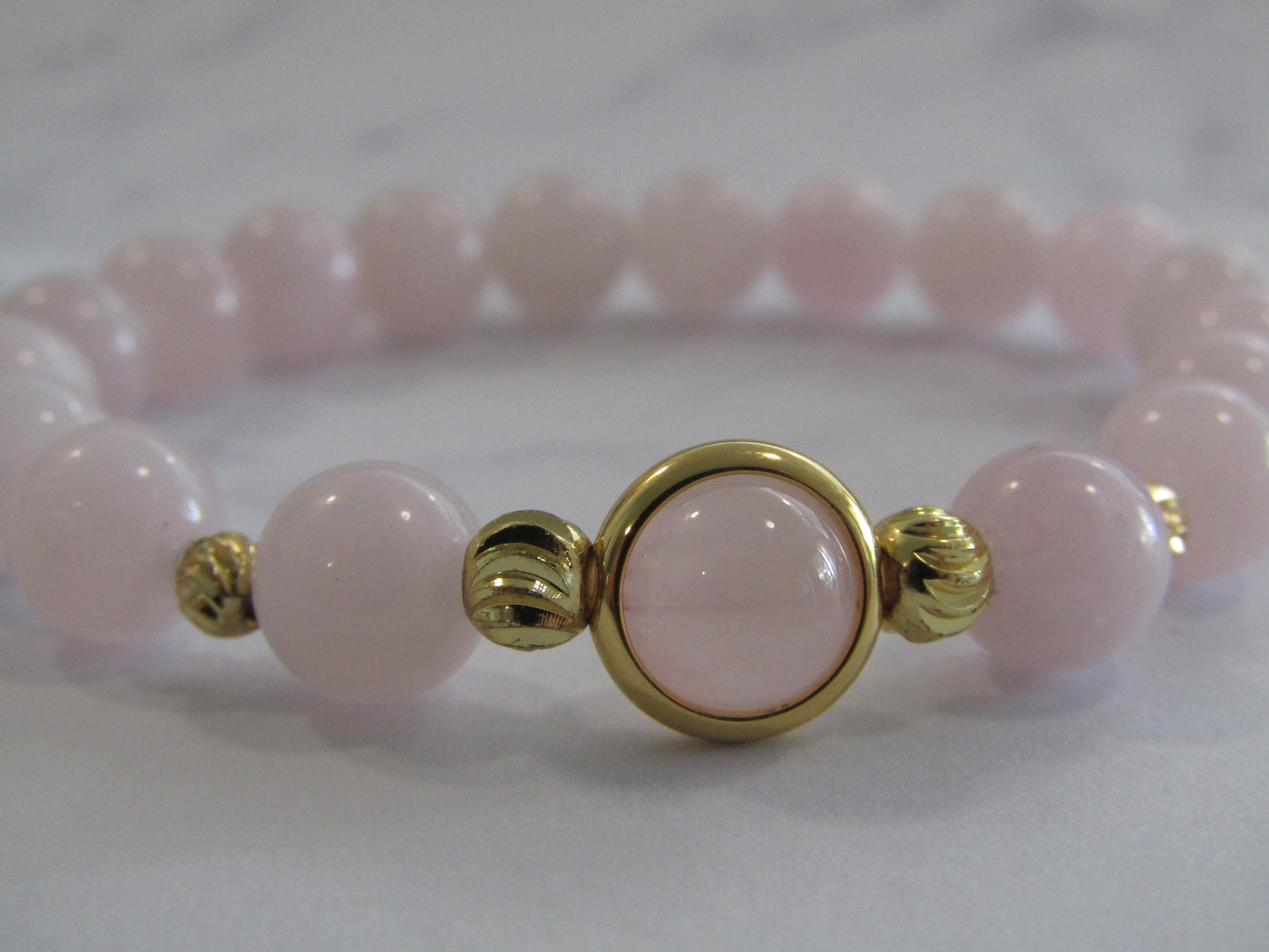 Grade A Rose Quartz (8mm) bracelet with 18k gold plated frame & 14k gold plated beads