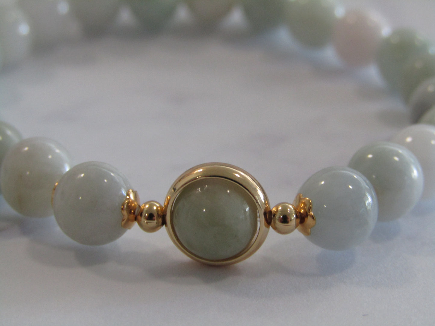 Grade A Jadite (8mm) bracelet with 18k gold plated frame & spacer beads