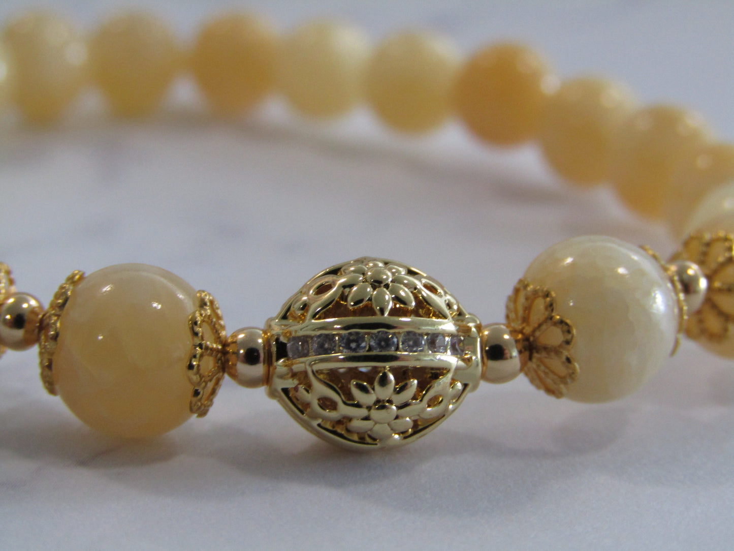 Honey Lemon Jade (8mm) bracelet with 18k gold plated Cubic Zirconia Bead