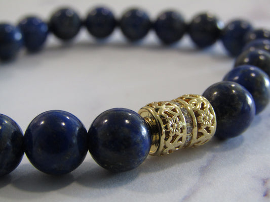 Grade A Lapis Lazuli (8mm) bracelet with 18k gold plated Cubic Zirconia bead