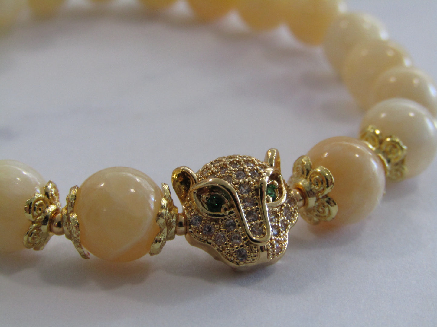 Lemon Jade (8mm) bracelet with 18k gold plated Cubic Zirconia leopard charm and spacer beads