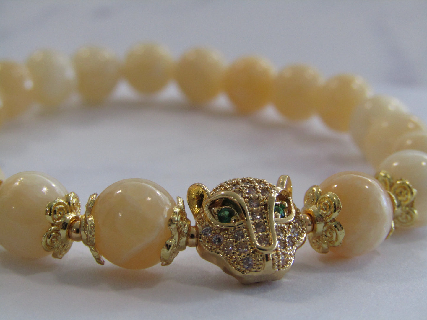 Lemon Jade (8mm) bracelet with 18k gold plated Cubic Zirconia leopard charm and spacer beads