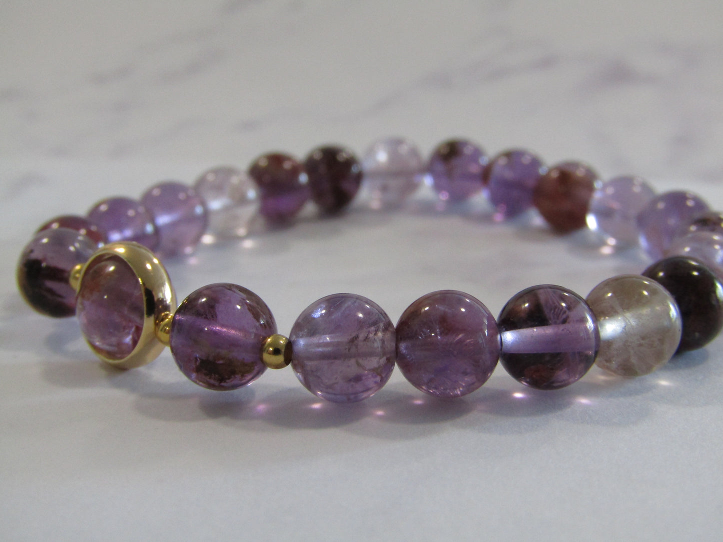 Purple Lodolite Quartz / Purple Phantom Quartz (8mm) bracelet with 18k gold plated frame and spacer beads